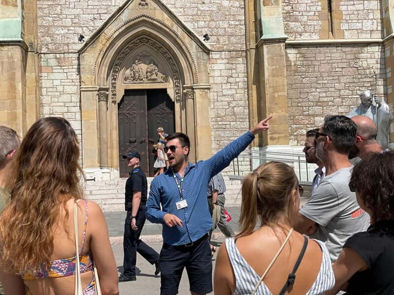Sarajevo Full Day Tour: Hotel Pickup And All Fees Included - Latin Bridge, Sacred Heart Cathedral, and the skyline of beliefs